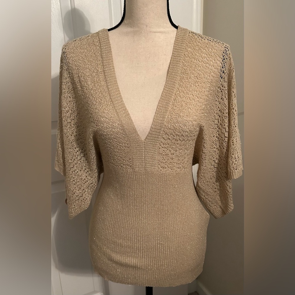 Gold knit top to be worn with camisole. Express Medium.